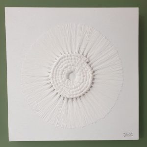 photo d'un tableau en spirale en macramé
